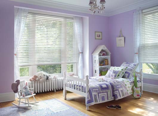 Custom Bedding in Child's Room with Everwood® Faux Wood Blinds
